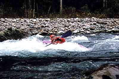 Kayaking_student_learning_to_playboat